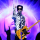 Prince performs his first of three shows onstage during “One Night... Three Venues” on March 28, 2009, in Los Angeles, Calif.